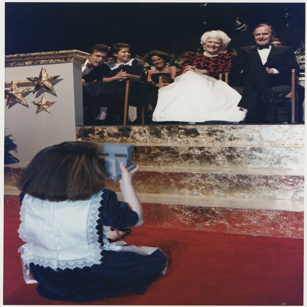 President-elect and Mrs. Bush have their picture taken by their granddaughter, Barbara Bush, at the Inaugural Gala on January 19, 1989 at the Convention Center in Washington, D.C